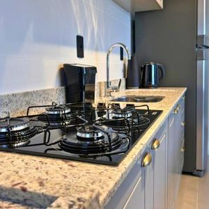 Apartamento com 64m², 2 dormitórios, 1 suíte, 1 vaga no Aston em Torres para Comprar