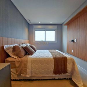 Apartamento com 102m², 3 dormitórios, 1 suíte, 2 vagas no Maui Residencial em Torres para Comprar