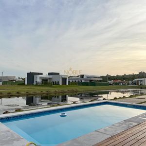 Casa de Condomínio com 228m², 3 dormitórios, 3 suítes, 2 vagas no Reserva das Águas em Torres para Comprar