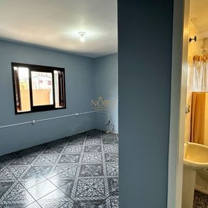 Apartamento com 94m², 3 dormitórios, 1 suíte, 2 vagas no Edifício Saron em Torres para Comprar