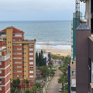 Apartamento com 94m², 2 dormitórios, 2 suítes, 2 vagas no Origem em Torres para Comprar