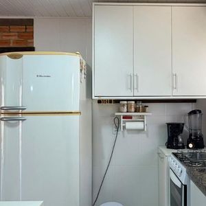 Casa com 98m², 3 dormitórios, 2 vagas no bairro Praia da Cal em Torres para Comprar