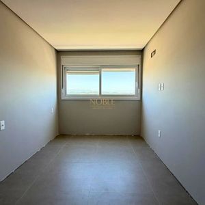 Apartamento com 70m², 2 dormitórios, 1 suíte, 1 vaga no Topazio em Torres para Comprar