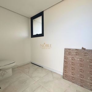 Casa com 272m², 3 dormitórios, 3 suítes, 4 vagas no bairro Itapeva em Torres para Comprar