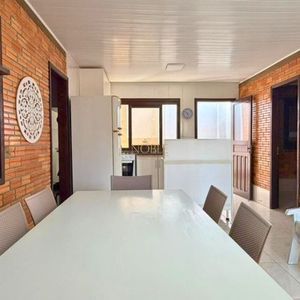 Casa com 98m², 3 dormitórios, 2 vagas no bairro Praia da Cal em Torres para Comprar