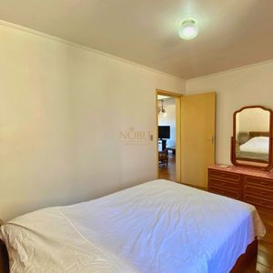 Apartamento com 82m², 2 dormitórios, 1 vaga no Edifício Dona Emília em Torres para Comprar