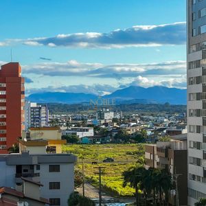 Apartamento com 78m², 2 dormitórios, 1 suíte, 2 vagas no Vista Mare em Torres para Comprar