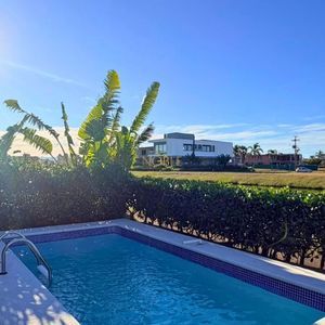 Casa com 265m², 3 dormitórios, 3 suítes, 2 vagas no Condomínio Ilhas Park em Torres para Comprar