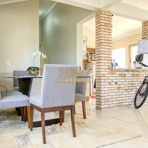 Casa, 2 dormitórios, 2 vagas no bairro Igra Norte em Torres para Comprar