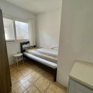 Casa com 500m², 7 dormitórios, 2 suítes, 2 vagas no bairro Centro em Torres para Comprar