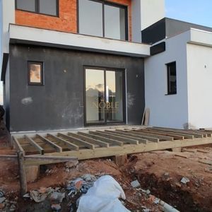 Casa de Condomínio com 204m², 3 dormitórios, 3 suítes, 2 vagas no Reserva das Águas em Torres para Comprar