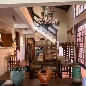 Casa com 247m², 5 dormitórios, 3 suítes, 3 vagas no bairro Praia Grande em Torres para Comprar