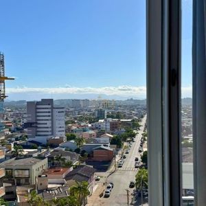 Apartamento com 68m², 2 dormitórios, 1 suíte, 1 vaga no Monet em Torres para Comprar