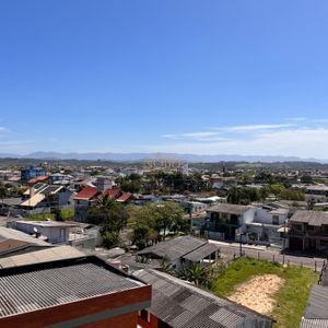 Apartamento, 2 dormitórios, 1 suíte, 1 vaga no Edifício Moma em Torres para Comprar