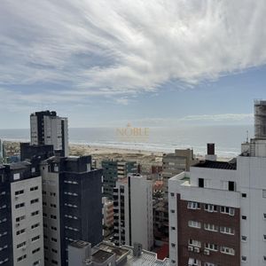 Apartamento com 90m², 2 dormitórios, 2 suítes, 2 vagas no Maui Residencial em Torres para Comprar