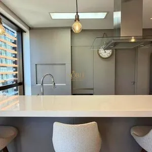 Apartamento com 103m², 3 dormitórios, 3 suítes, 2 vagas no Absoluto em Torres para Comprar