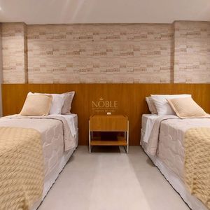 Apartamento com 108m², 3 dormitórios, 1 suíte, 2 vagas no Maui Residencial em Torres para Comprar