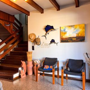 Casa com 338m², 4 dormitórios, 2 suítes, 3 vagas no bairro Centro em Passo de Torres para Comprar