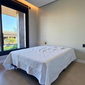 Casa com 180m², 3 dormitórios, 1 suíte, 2 vagas no bairro Praia da Cal em Torres para Comprar