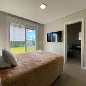 Casa de Condomínio, 4 dormitórios, 4 suítes, 2 vagas no Condomínio Ilhas Park em Torres para Comprar