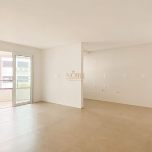 Apartamento com 83m², 2 dormitórios, 1 suíte, 2 vagas no Residencial Exclusive em Torres para Comprar