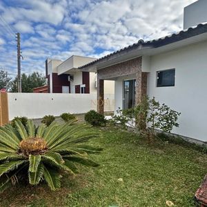 Casa com 125m², 3 dormitórios, 2 vagas no bairro Loteamento Caravelle em Passo de Torres para Comprar