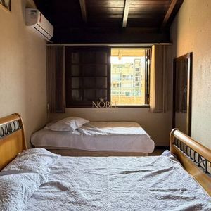 Casa com 193m², 3 dormitórios, 1 suíte, 3 vagas no bairro Praia Grande em Torres para Comprar