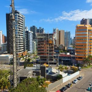 Apartamento com 131m², 3 dormitórios, 1 suíte, 2 vagas no Torre do Sol em Torres para Comprar