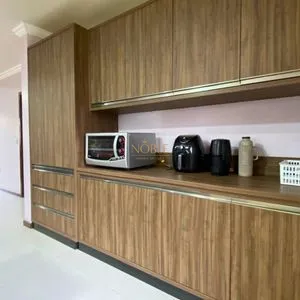 Casa com 148m², 3 dormitórios, 1 suíte, 2 vagas no bairro Morada das Palmeiras em Torres para Comprar