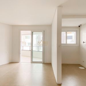 Apartamento com 83m², 2 dormitórios, 1 suíte, 2 vagas no Residencial Exclusive em Torres para Comprar