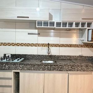 Casa com 130m², 2 dormitórios, 2 vagas no bairro Praia da Cal em Torres para Comprar