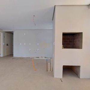 Apartamento com 114m², 3 dormitórios, 1 suíte, 2 vagas no Titanium em Torres para Comprar