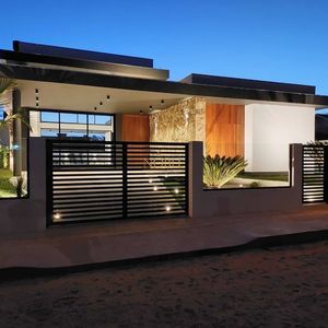 Casa com 288m², 4 dormitórios, 4 suítes, 4 vagas no bairro Bella Torres em Passo de Torres para Comprar