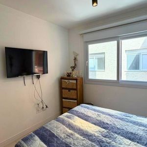 Apartamento com 101m², 2 dormitórios, 2 suítes, 2 vagas no Belize em Torres para Comprar