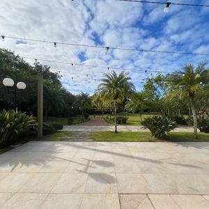 Casa com 600m², 4 dormitórios, 1 suíte, 4 vagas no bairro Igra Norte em Torres para Comprar