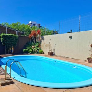 Casa, 3 dormitórios, 1 suíte, 2 vagas no bairro Stan em Torres para Comprar