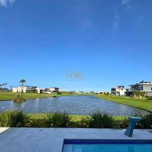 Casa de Condomínio com 311m², 3 dormitórios, 3 suítes, 2 vagas no Reserva das Águas em Torres para Comprar