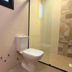 Casa com 215m², 3 dormitórios, 1 suíte, 2 vagas no bairro Morada das Palmeiras em Torres para Comprar