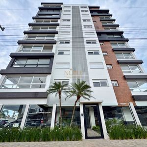 Apartamento com 72m², 2 dormitórios, 1 suíte, 1 vaga no Topazio em Torres para Comprar