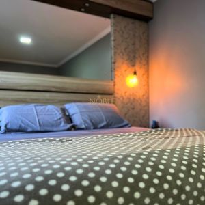 Casa com 184m², 3 dormitórios, 1 suíte, 2 vagas no bairro Igra Norte em Torres para Comprar