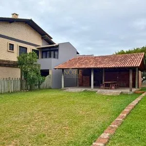 Casa, 3 dormitórios, 3 vagas no bairro Praia Itapeva em Torres para Comprar