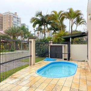 Apartamento com 112m², 2 dormitórios, 2 suítes, 3 vagas no Villa de Sagres em Torres para Comprar