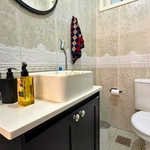 Casa com 209m², 3 dormitórios, 1 suíte, 2 vagas no bairro Igra em Torres para Comprar