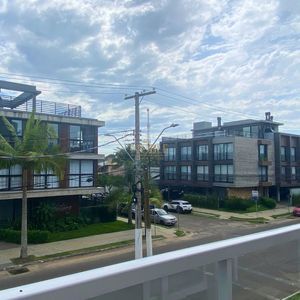 Duplex com 58m², 1 dormitório, 1 suíte, 1 vaga no CARPE DIEM em Torres para Comprar