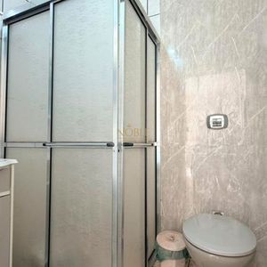 Casa com 171m², 4 dormitórios, 3 vagas no bairro Porto Alegre em Torres para Comprar