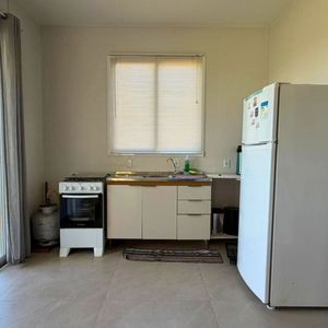 Casa com 226m², 3 dormitórios, 1 suíte, 2 vagas no bairro Paraíso em Torres para Comprar