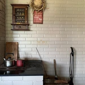 Sobrado com 290m², 4 dormitórios, 1 suíte, 2 vagas no bairro Igra Norte em Torres para Comprar