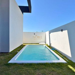 Casa com 146m², 3 dormitórios, 1 suíte, 2 vagas no Loteamento Jardim América em Passo de Torres para Comprar