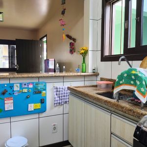 Casa, 6 dormitórios, 2 suítes, 3 vagas no bairro Getúlio Vargas em Torres para Comprar