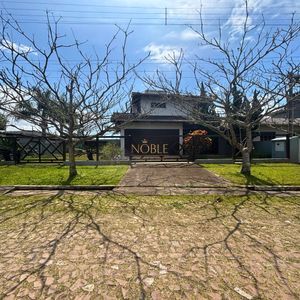 Casa, 3 dormitórios, 1 suíte, 2 vagas no bairro Itapeva Norte em Torres para Comprar